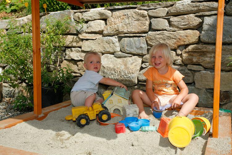 Sandbox with toys